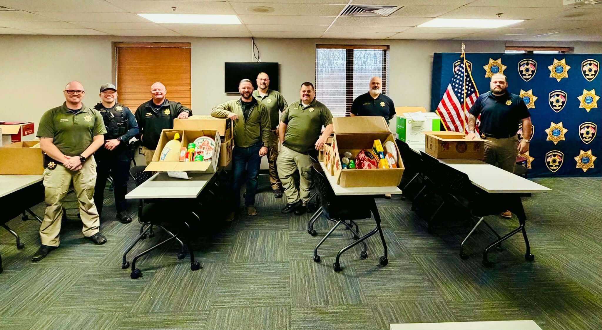 Officers and food delivery boxes